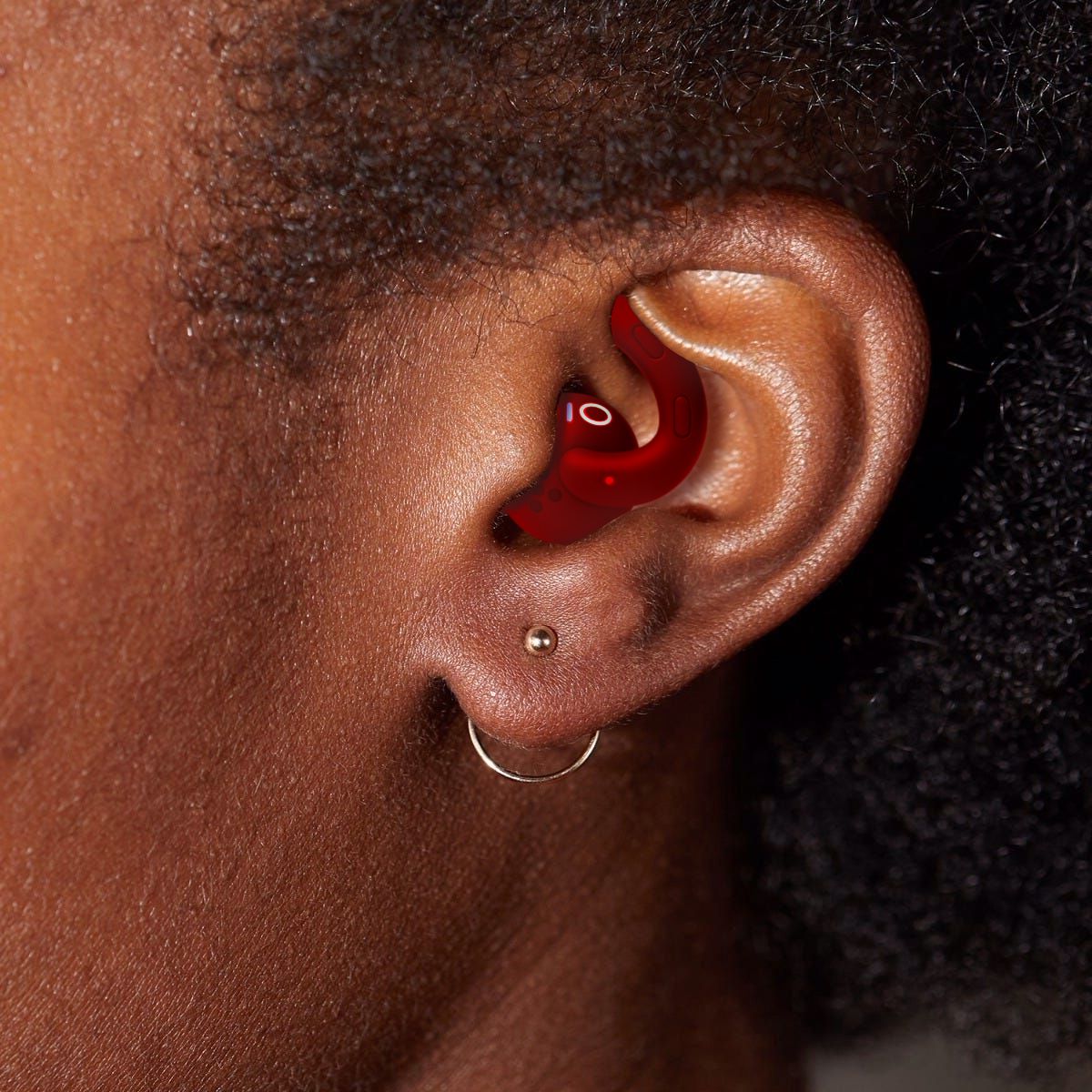 Person with earbuds listening to music